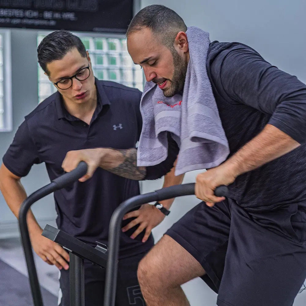 personal-training-session-capitol-hill-denver Client working with a personal trainer during a workout in Capitol Hill Denver