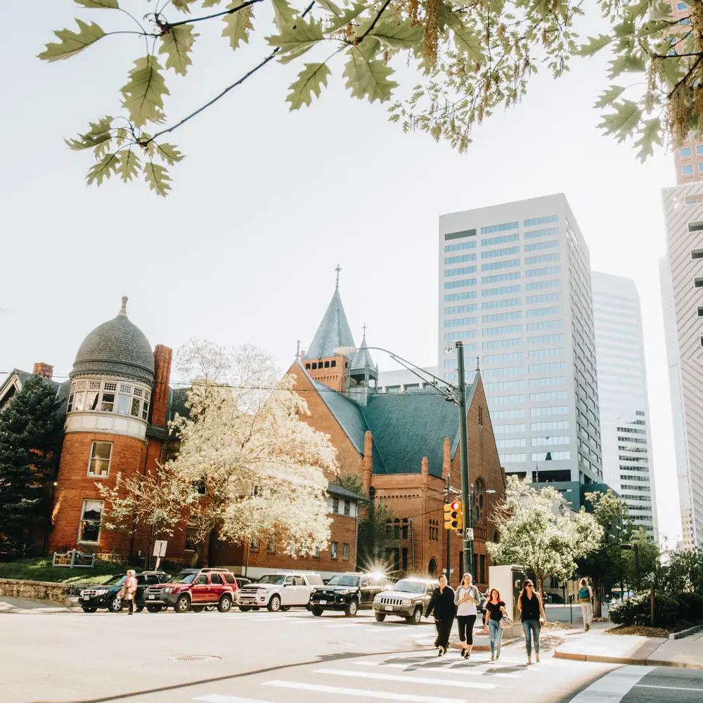 Uptown Denver neighborhood street with apartments and walkable area